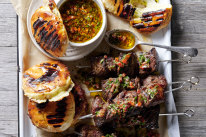 Picanha beef skewers with cheese-stuffed flatbreads.