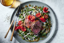 A zingy tomato-dressed salad is the ideal accompaniment to roast lamb.