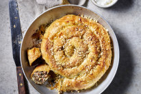 Serve this lamb, rice and vine leaf borek with garlic dip.