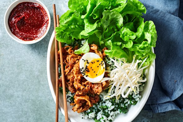 Korean beef and green rice bowl with soft-boiled eggs.