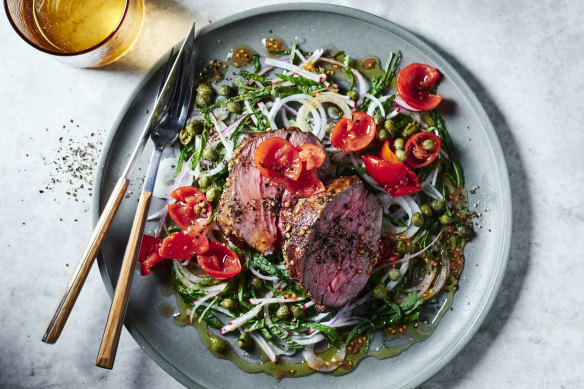 A zingy tomato-dressed salad is the ideal accompaniment to roast lamb.