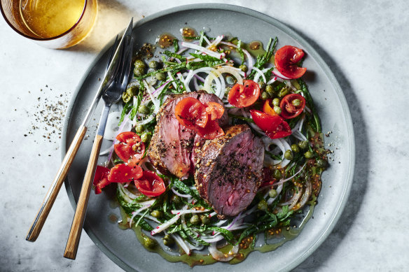 A zingy tomato-dressed salad is the ideal accompaniment to roast lamb.