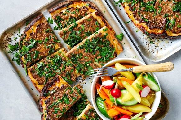 Spiced lamb flatbreads with quick chilli and vegetable pickle.