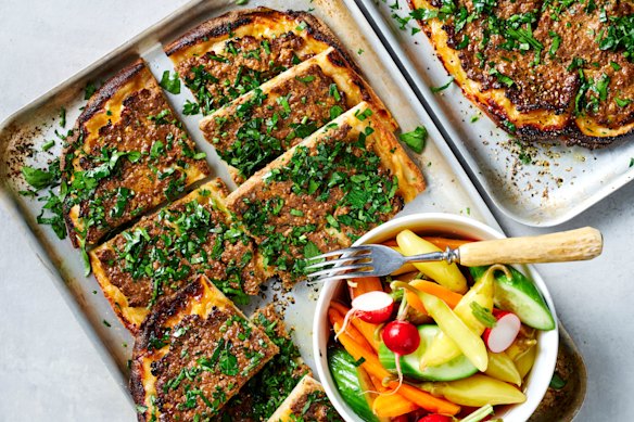 Spiced lamb flatbreads with quick chilli and vegetable pickle.