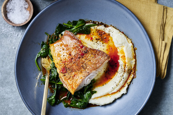 Piri-piri chilli butter fish on a bed of garlicky mash.