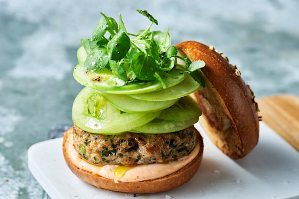 Herby pork burger with salted apple slaw and smoky aioli.