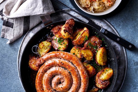 Serve spicy lamb merguez sausages with crushed potatoes and caraway butter. 