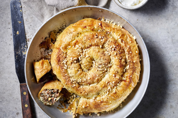 Serve this lamb, rice and vine leaf borek with garlic dip.