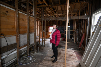 Lyn Osborne in the gutted Kalorama home she has decided to sell. 