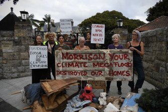 The Lismore residents calling for a response to climate change from the Prime Minister on Monday. 