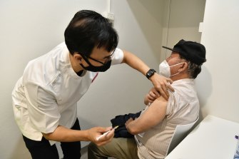Chieu Lim, 81, receives a vaccine at Cabramatta in Sydneyâ€™s west this week as the city battles a Delta outbreak.