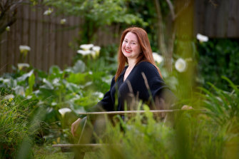 Hannah Kent, pictured in her garden in South Australia, wrote her novel in the fog of parental sleep deprivation.