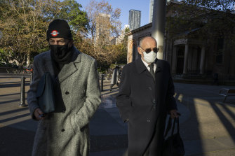 Chris Dawson (right) arriving at the NSW Supreme Court on Wednesday.