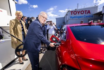 Holding a hose: Prime Minister Scott Morrison at the Toyota Hydrogen Centre in Altona this week.
