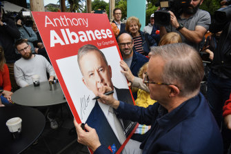 Photographs show the newly minted Australian Labor Prime Minister Anthony Albanese on a meet and greet of his constituents in the  Grayndler seat at Marrickville library.