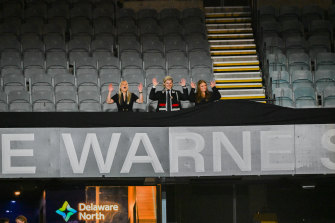 Brooke Warne, Jackson Warne and Summer Warne unveil the Shane Warne Stand.