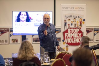 Phil Cleary addresses a community summit on preventing family violence at Cardinia Cultural Centre.