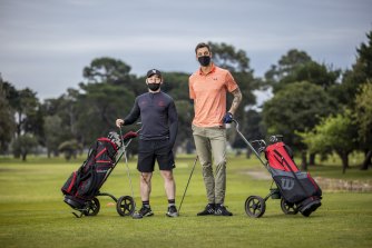 Shane Nolan [left] and Anthony Carden were eager to make the most of the eased restrictions at Albert Park Golf Club.