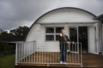Rosemary Roberts outside the newly renovated Nissen Hut where she grew up in Belmont North.