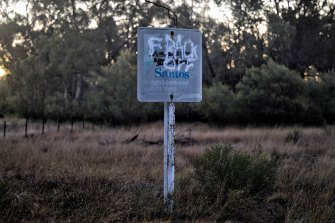 Anti-CSG graffiti on a sign near the Wilga Park Power Station near Narrabri. Santos says there will be no fracking occurring in the Narrabri region.