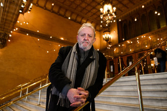 Jim Sherlock, now 67, at the Regent Theater where he hid as a boy.