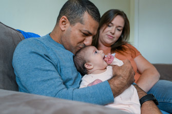 Iraqi Uber driver Thames Alkhammat with his wife Elisha van den Brink and two-month-old daughter Amira.

