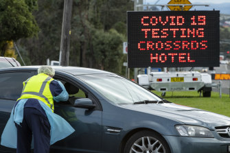 A drive-through coronavirus testing clinic at the Crossroads Hotel in Casula on Wednesday.