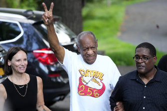 Comedian Bill Cosby, centre, and spokesperson Andrew Wyatt, right,  outside Cosby’s home in Elkins Park, Pennsylvania, just hours after the state’s highest court overturned his sex assault conviction. 