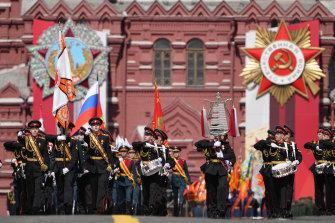 Russian servicemen march during the Victory Day military parade in Moscow, Russia, Monday, May 9, 2022, marking the 77th anniversary of the end of World War II. 