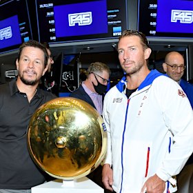 Better days: F45 founder Adam Gilchrist (right) and shareholder Mark Wahlberg on the floor of the New York Stock Exchange in 2021.