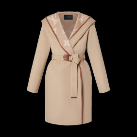 Sophie Monk is wearing her LV “Hooded Wrap” coat everywhere.