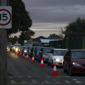 Long queues for the 24-hour COVID testing drive through clinic at Fairfield West, in Sydney.