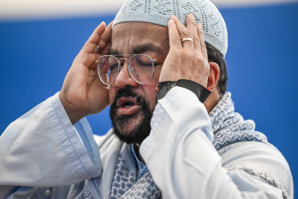 Mohamed Mohideen leads Muslim prayers at Monash University.