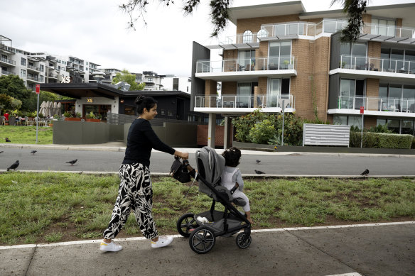 Jiya Verma, who moved into a newer apartment building, and in the background a new waterfront cafe XS.