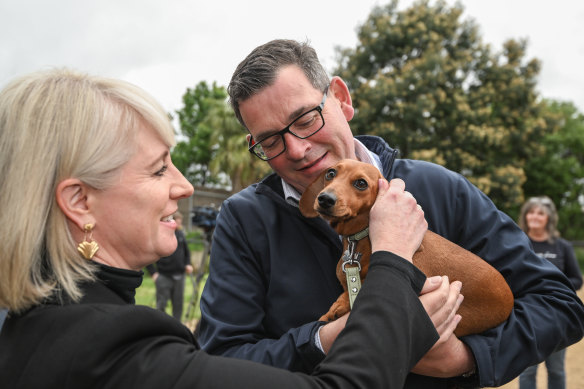 Victorian Premier Daniel Andrews, his wife Catherine, and Penny the sausage dog in Caulfield East.