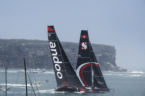 Scallywag and Andoo Comanche during the start of the 2023 Sydney to Hobart Yacht race.