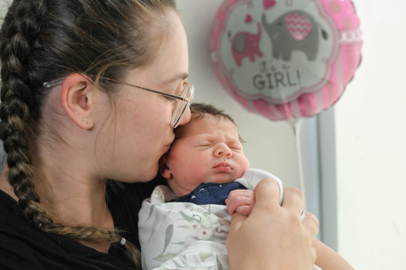 Mum Madeline Leahy with her baby girl Amelia, born 12 hours before International Women’s Day. 
