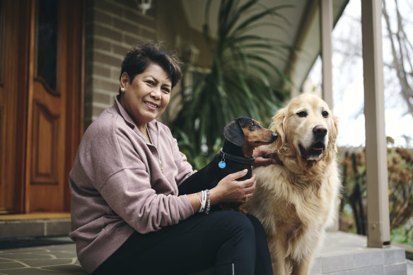 Nill Kyrgios outside the family’s Canberra home with Nick’s two dogs, Quincy and King.