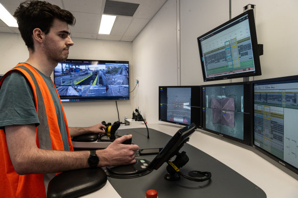 A Qube worker in the control room for the company’s import-expert terminal at Moorebank.