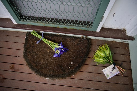 Bouquets left at the doorstep of the Korumburra home of mushroom poisoning victims Ian and Heather Wilkinson. 
