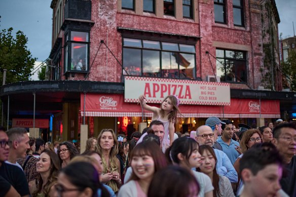 Spectators enjoys the show.