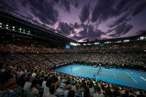 Night for it: A packed Rod Laver Arena watches the match.