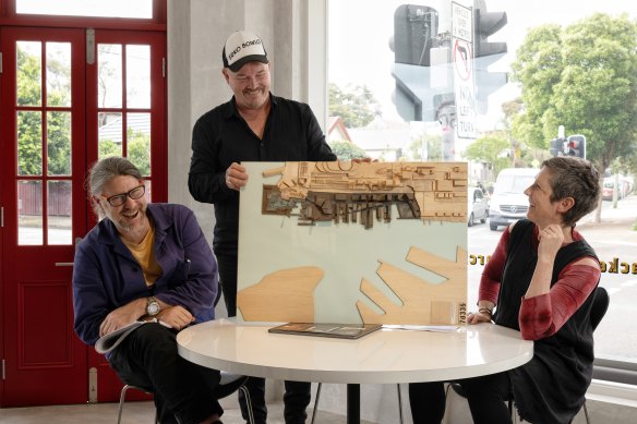 Architects Richard Healy Finlay, Neil Mackenzie and Heidi Pronk with their Barangaroo model from the early 2000s.
