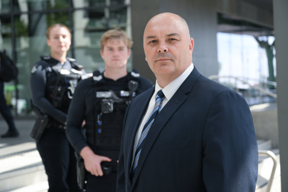 Viper taskforce Detective Inspector Craig Darlow with two members of the unit.