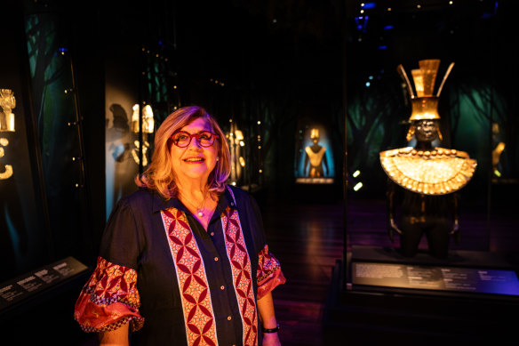 Kim McKay with some of the gold artefacts in the museum’s latest exhibition.