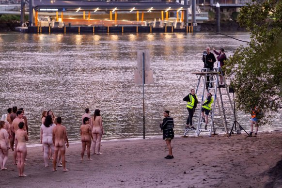 Spencer Tunick organises a photo shoot on the banks on the Brisbane River at Kangaroo Point.