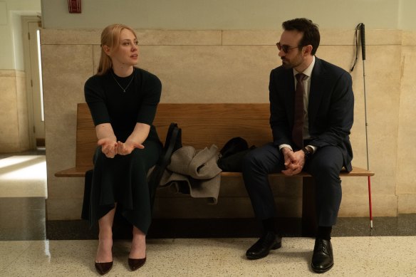 Deborah Ann Woll as Karen Page and Charlie Cox as Daredevil/Matt Murdock.