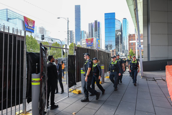 Members of Victoria Police patrol the Melbourne Convention and Exhibition Centre ahead of the 2024 ASEAN-Australia Special Summit.