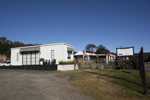 A Mini Hamptons display home and office remain on the main street of Mittagong, six months after the company went under.