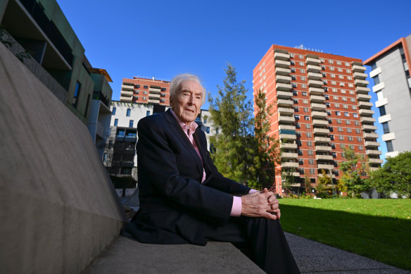 97-year-old architect Peter McIntyre at the Carlton public housing flats he helped design in the 1960s.